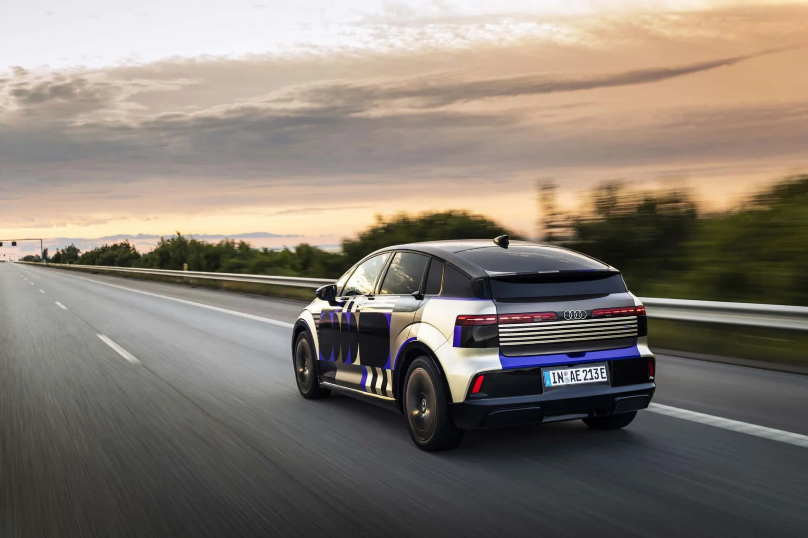 Audi A2 e-tron with design livery - Outdoor dynamic shot, exterior, three-quarter-rear-view