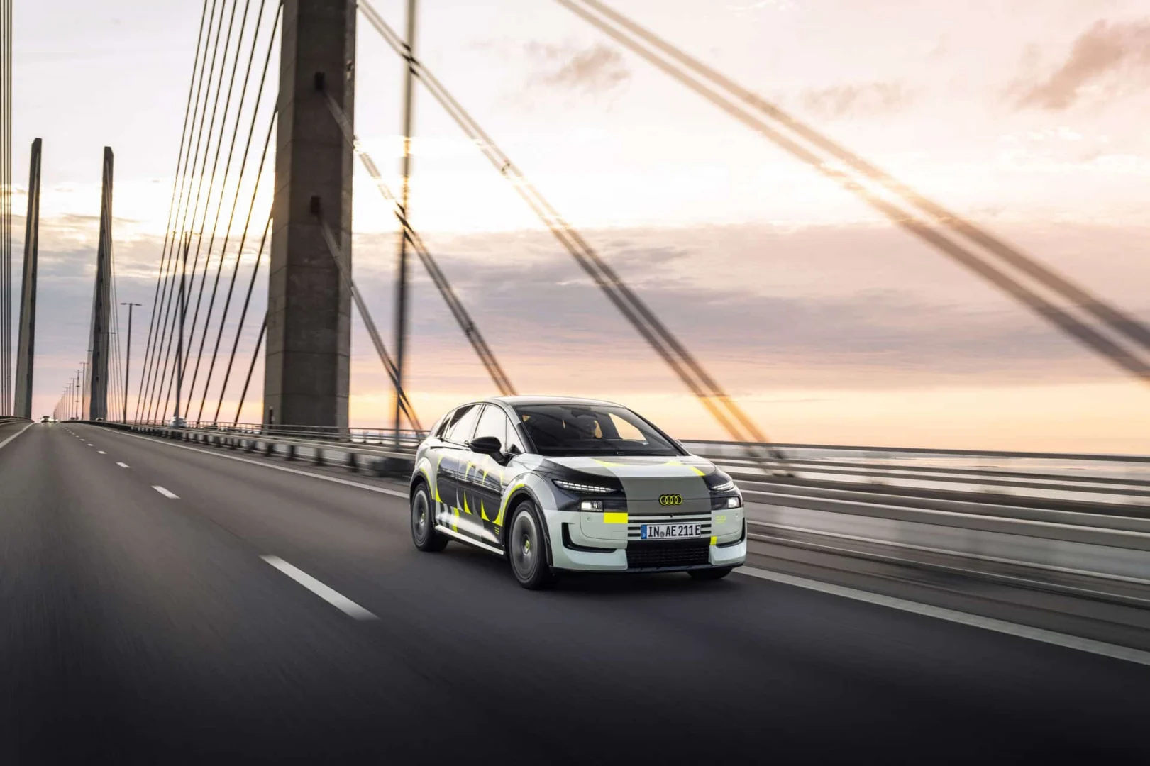 Audi A2 e-tron with design livery - Outdoor driving shot, exterior, front three-quarter view.